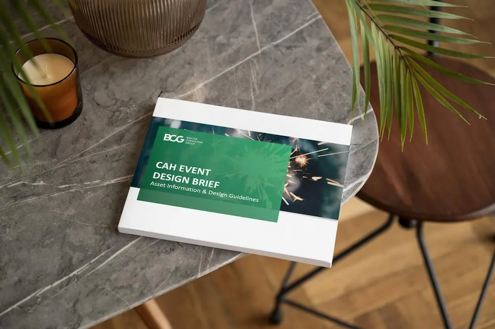 Printed event design brief on a table